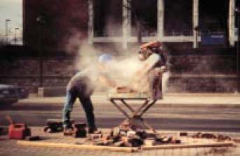 Photo of worker with dust surrounding head