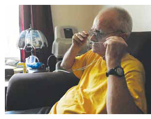 Retired coal miner Steve Day, 67, is tethered to an oxygen tank 24 hours a day.