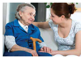Aide with an elderly patient