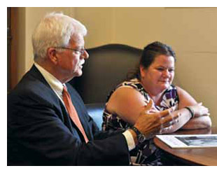 Congressman George Miller talks with Betty Harrah in his Washington, DC office. Harrah’s brother Steve was killed at the Upper Big Branch coal mine.