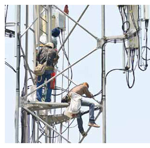 Workers on a cell-phone tower