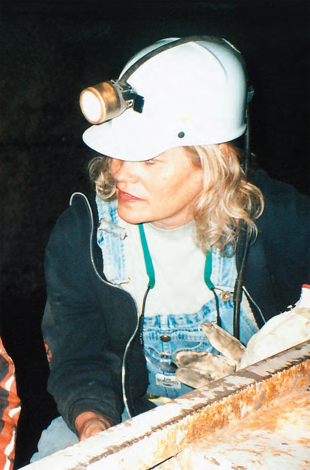 female miner talking