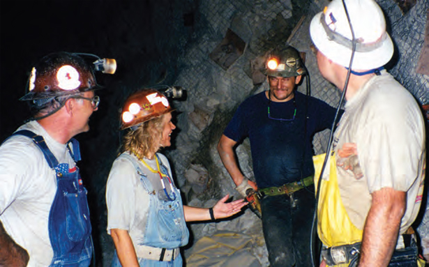 picture of miners talking