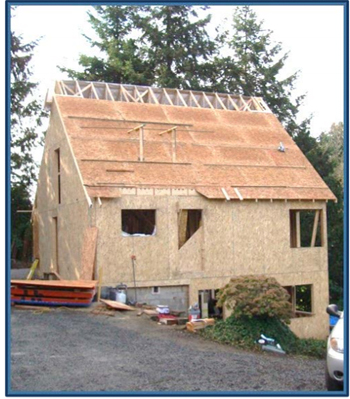 Incident scene showing the two-story residential 
12/12 pitch roof from which the victim fell 18 feet 
while installing sheathing without using fall protection.