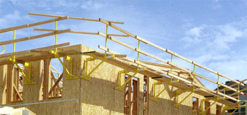 Figure 19 – A scaffold rigged for installing floor joists and floor trusses.