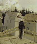 Figure 27 - Worker installing guardrails.