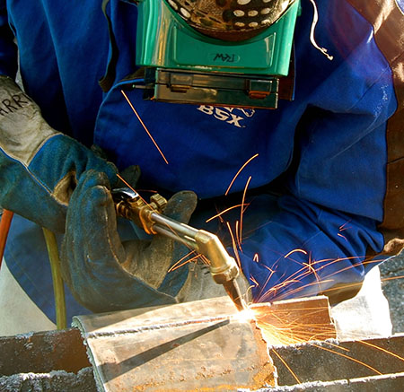 Photograph of trade school apprentice at risk of ultrafine exposures