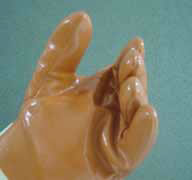 photo of gloved hand doing unidirectinoal strain
