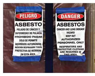 Asbestos warning signs in Spanish and English.