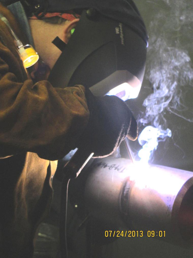 image of worker stainless steel welding with no LEV