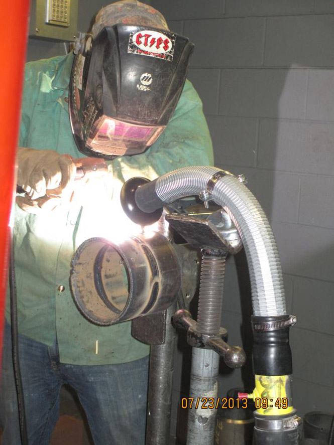 image of worker welding carbon steel with LEV