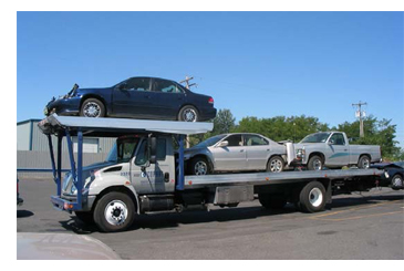 Photo of cars on transporter
