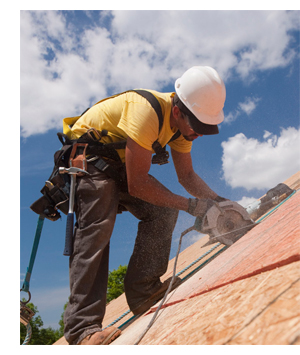 photo of roofer sawing
