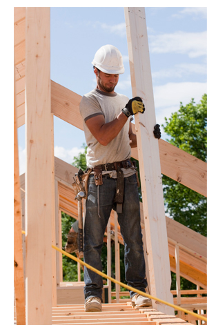 photo of worker holding lumber