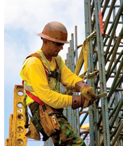 Man with harness and personal fall arrest system