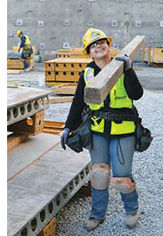 female worker with plywood
