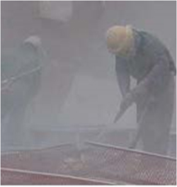 a man working in enclosed area with silica dust