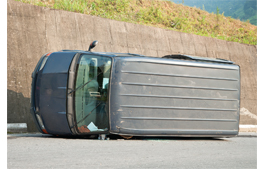 Picture of a van flipped on its side