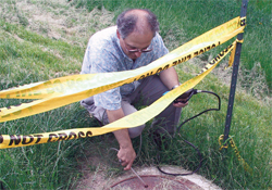 man investigating a scene of an incident