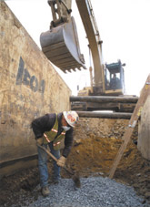 OSHA's excavation standard requires employers to provide sloping, benching, shoring, or shielding to protect workers in excavations five feet or deeper