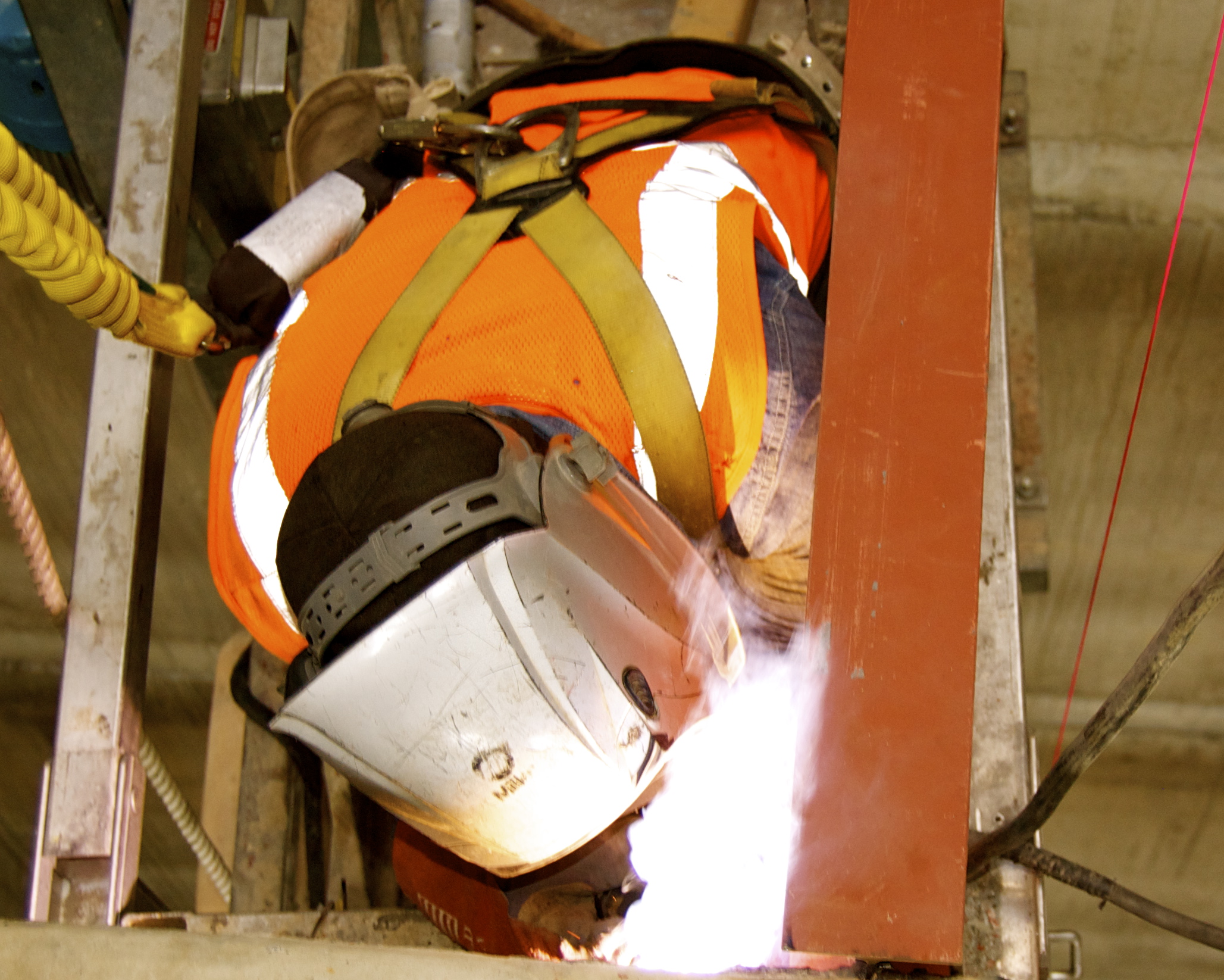 Welder with a Harness
